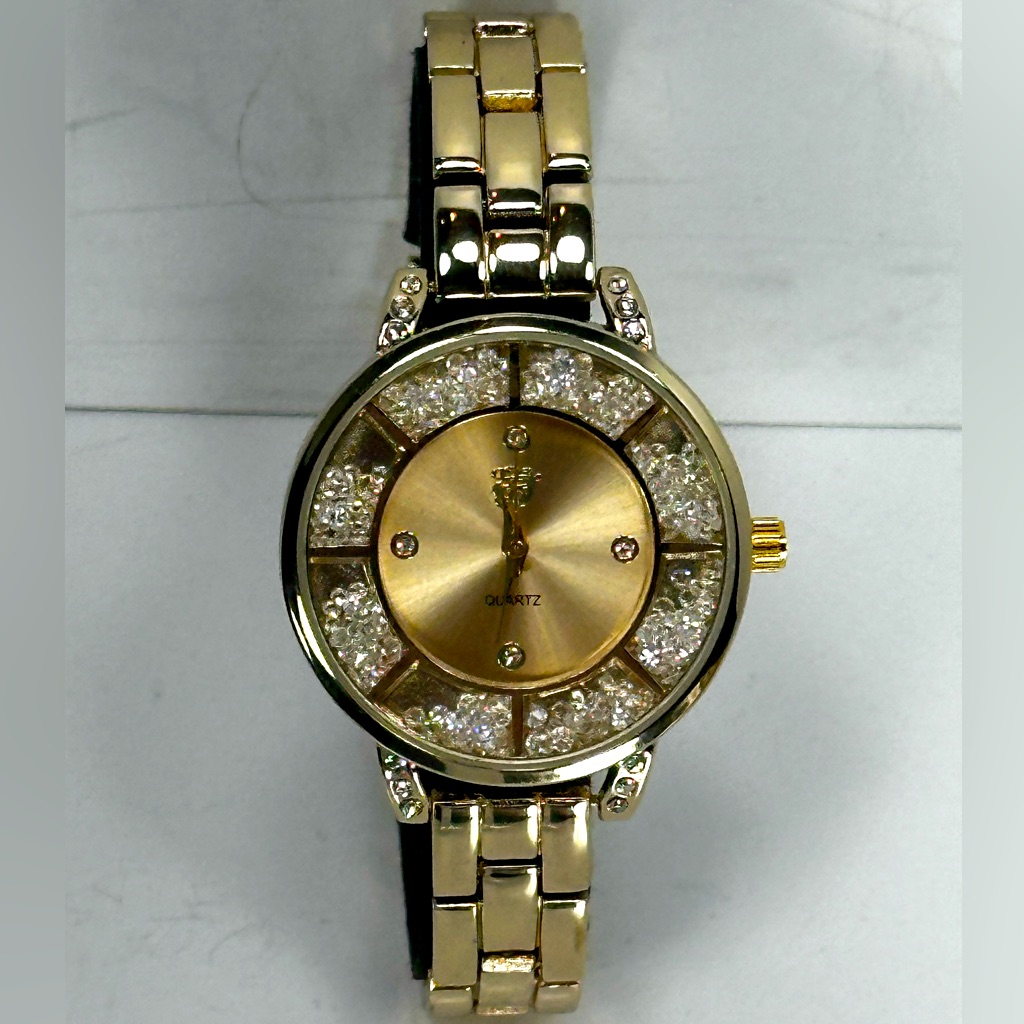 Vintage Elizabeth Taylor Floating White Diamonds Gold Quartz Womens Watch